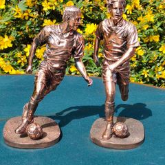 Two Gilded footballers