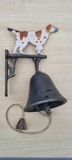 Vintage door bell with a dog figurine