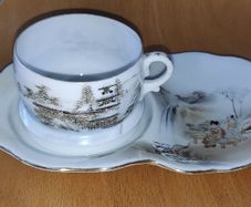 Vintage Japanese eggshell porcelain teacup with saucer
