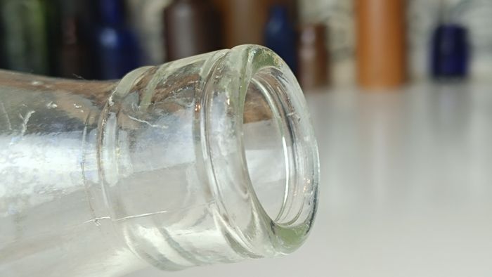502 - Vintage Clear Glass Cork Top Collectible Decorative Lee Strand Creamery Milk Bottle