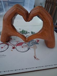 Wooden hands ornament