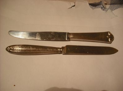 2 antique silver handled butter knifes