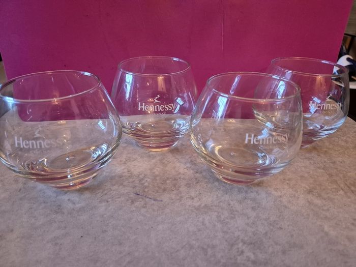A Set of 4 Hennessy Cognac Glasses Branded with the Hennessy Cognac Logo