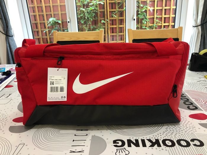 This is a Brand New Nike bag - Red & Black