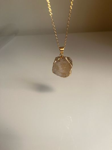 Costume necklace with stone pendant
