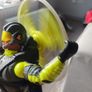 Limited edition This Action Man Air Patrol figure from Hasbro is a 12-inch electronic toy featuring a propeller backpack.The figure wears a distinctive neon yellow and gray flight suit and includes a helmet with a yellow visor. Image 5