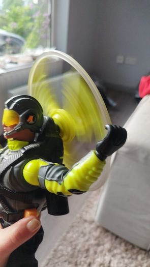 Limited edition This Action Man Air Patrol figure from Hasbro is a 12-inch electronic toy featuring a propeller backpack.The figure wears a distinctive neon yellow and gray flight suit and includes a helmet with a yellow visor.