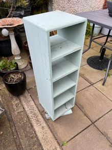 Cd wooden rotating shelve. Ideal for floristry nick nacks