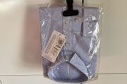 Next light blue long sleeve shirt. Brand new. Age 8-9