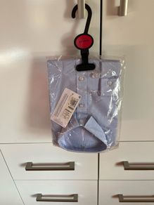 Next light blue long sleeve shirt. Brand new. Age 8-9