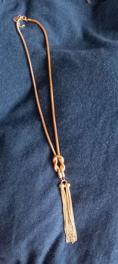 Long gold 1920s style necklace