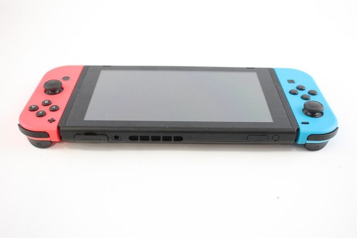 Nintendo Switch Neon Red & Blue Complete Bundle!