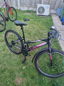 2 like new mountain bikes 150 for males bike 100 for smaller bike