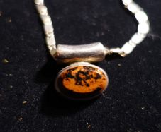 Tiger eye style stone in silver set with large linked silver chain