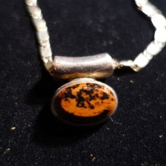 Tiger eye style stone in silver set with large linked silver chain
