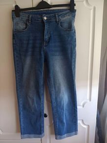 Mid-wash Distressed Jeans with Cuffed Hem.
