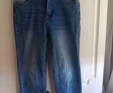 Mid-wash Distressed Jeans with Cuffed Hem.