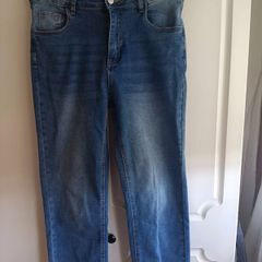 Mid-wash Distressed Jeans with Cuffed Hem.