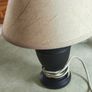 Small black carmic table lamp and shade in working order.38 cm, tall all togther. Image 3