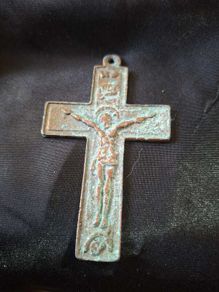 A Rare Victorian Bronze Crucifix Underneath Christs feet, there is an arched shape with a round object inside. This represents the Skull of Adam