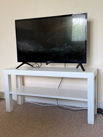 TV with Roku and Console Table