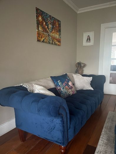 3 & 2 seater navy velvet chesterfield style couches with matching footstool with removable glass top
