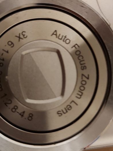 Z880 Digital Camera, Takes 2AA Batteries, working fine, has a modification that doesn't affect its performance