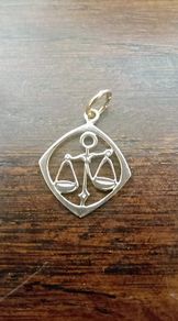 Solid 9 carat gold star sign Libra pendant