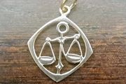 Solid 9 carat gold star sign Libra pendant