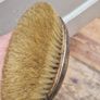 Rough Estimate of 35/40 grams of Antique Silver Brushes and Leather Case Image 8