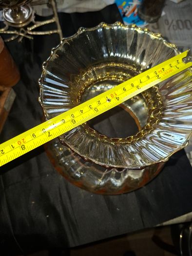 A Beautiful Amber Glass Oil Lamp Shade featuring a bulbous, ribbed body and a wide, ruffled, fluted rim, Postage Available