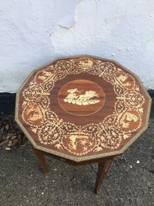 Ornate inlaid Chariot design side table with hidden compartment.