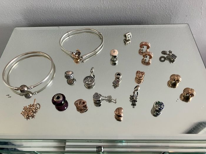 Assorted pandora charms and bracelets