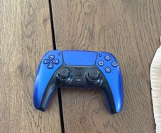 PS5 and a blue ps5 controller