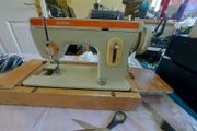 Brother Sewing Machine Model E, 671, With Pedal-Power Supply, Accessories, in reasonable condition, Box Cover &amp; Base wood has major wear, but actually machine seems fine
