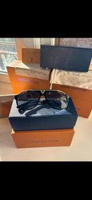 Lv glasses/shades black and gold