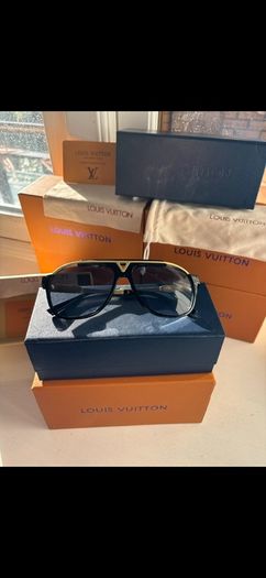 Lv glasses/shades black and gold