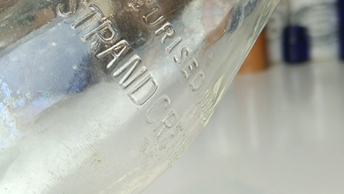 502 - Vintage Clear Glass Cork Top Collectible Decorative Lee Strand Creamery Milk Bottle