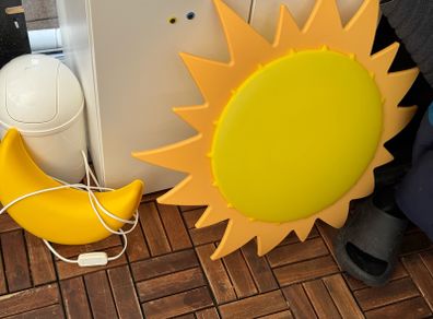 IKEA lights, a sun ceiling light and a moon wall light.