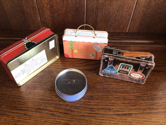 A collection of 4 Small tins