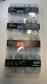 Assorted washers, hex nuts, hose clips, hooks