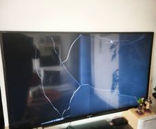 Sony 48" Smart TV with cracked screen (for parts/repair)