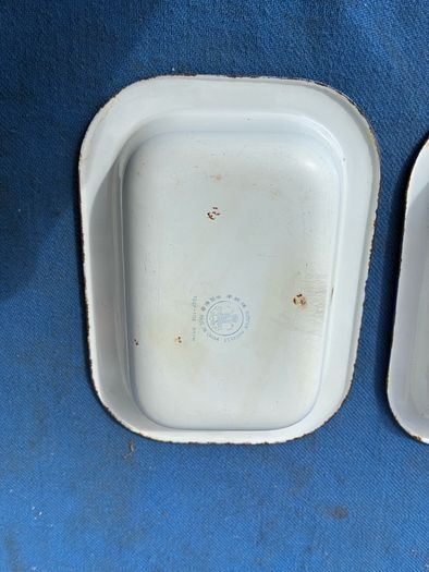 Matching pair of enamel dishes