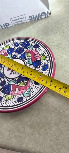 3 hanging wall plates -1- from Malta hand painted -2- from PORTGAL HAND PAINTED-3- FROM MAROCO - EACH IS 22.00 Euro.