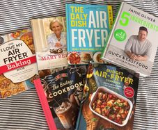 6 cook books and book stand