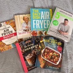 6 cook books and book stand
