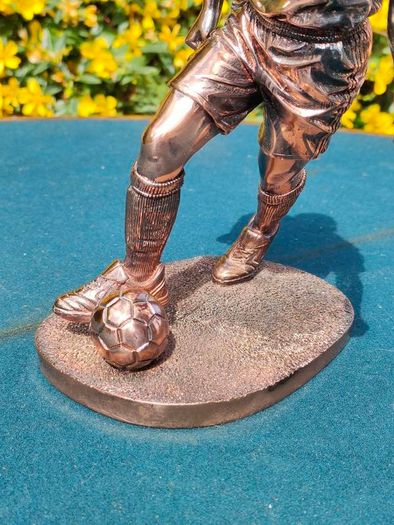 Two Gilded footballers