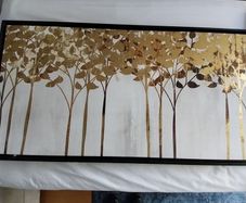 Black framed canvas picture with gold flowers
