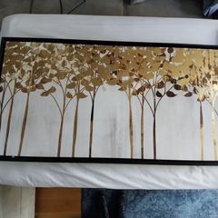 Black framed canvas picture with gold flowers