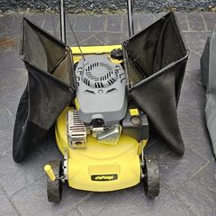 Self propelled petrol lawnmower with 2 grass boxes and manual